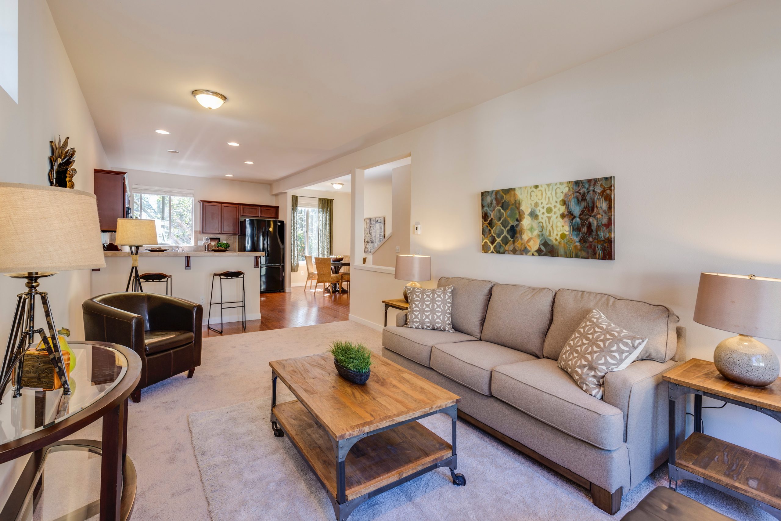 living room with beige furniture