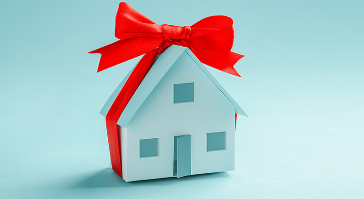 picture of home with red ribbon